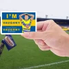 vaughny hand Hand holiding the Paul Vaughn warrington wolves fan sticker with an image of Paul Vaughn and the wording I'm Vaughny, Vaughny, Vaughny Vaughny